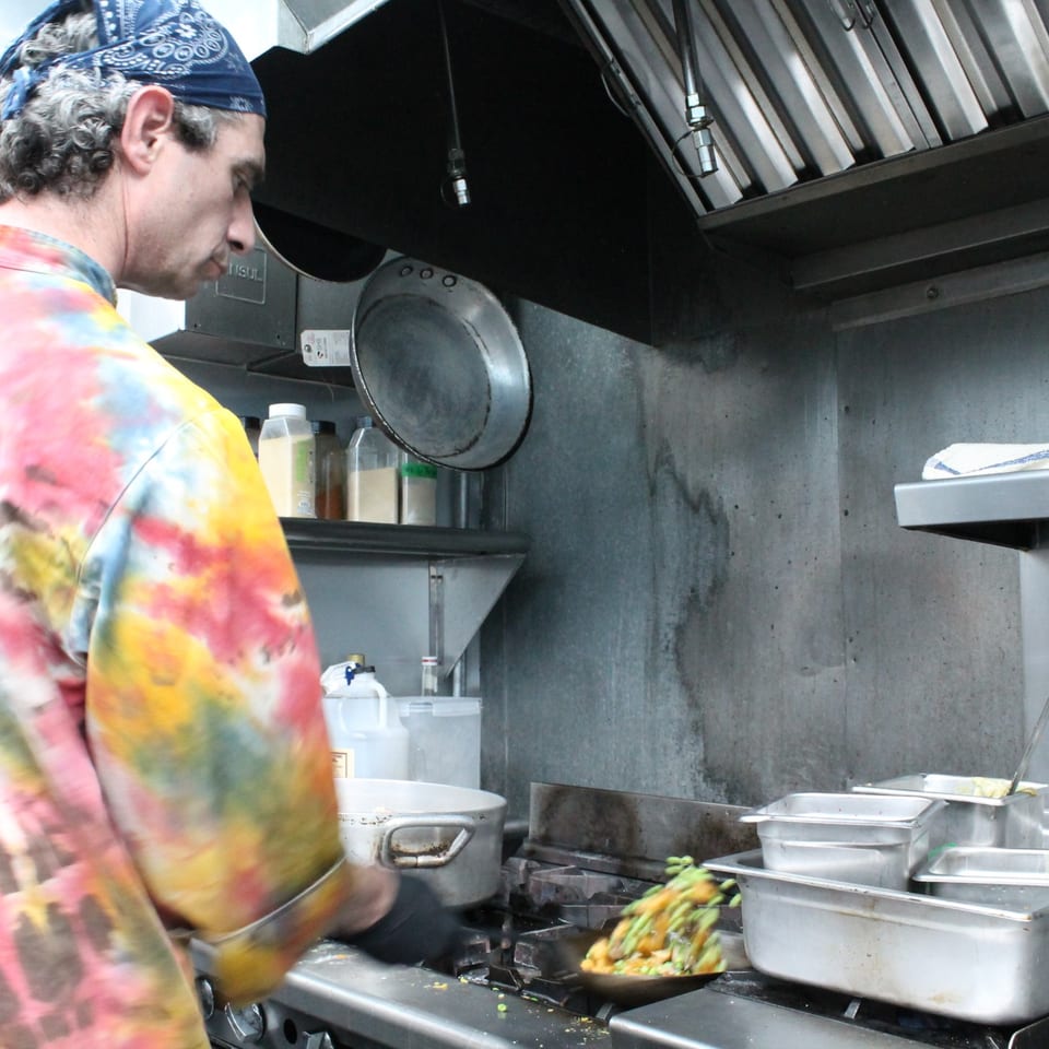 Cooking during a Hummingbird Club community event